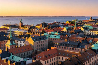 Rooftop panorama of Sodermalm district in Stockholm with Baltic waters in distance